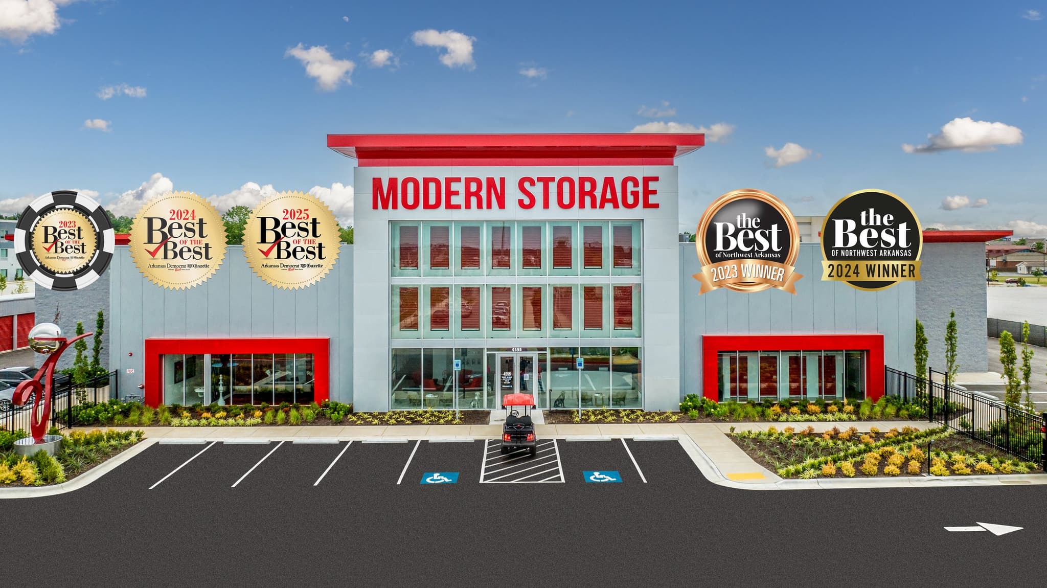 Exterior of a Modern Storage® facility featuring “Best of the Best” and “The Best of Northwest Arkansas” award badges