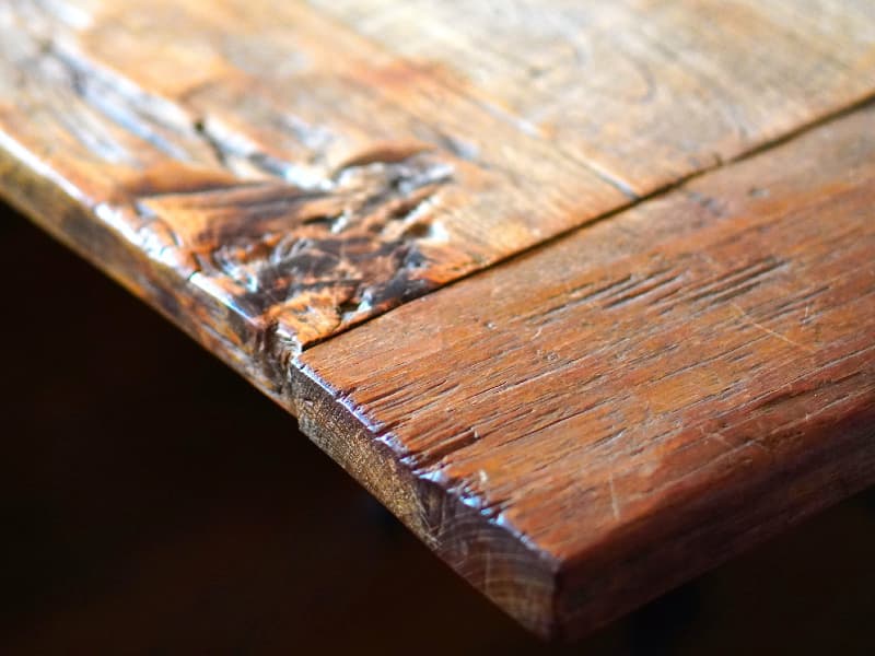 Wooden furniture being prepared for climate-controlled storage