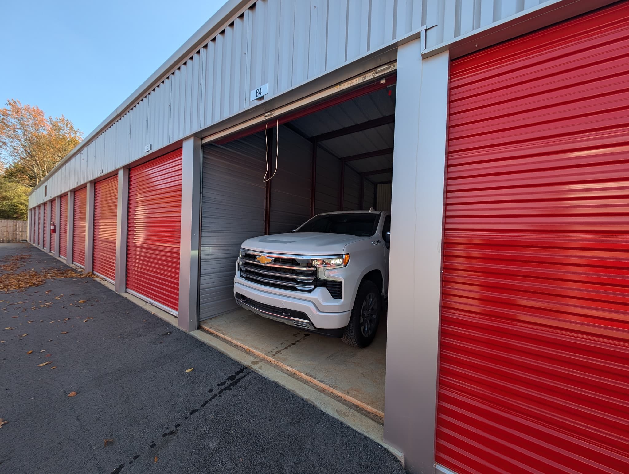 A vehicle stored indoors at a Modern Storage facility during winter