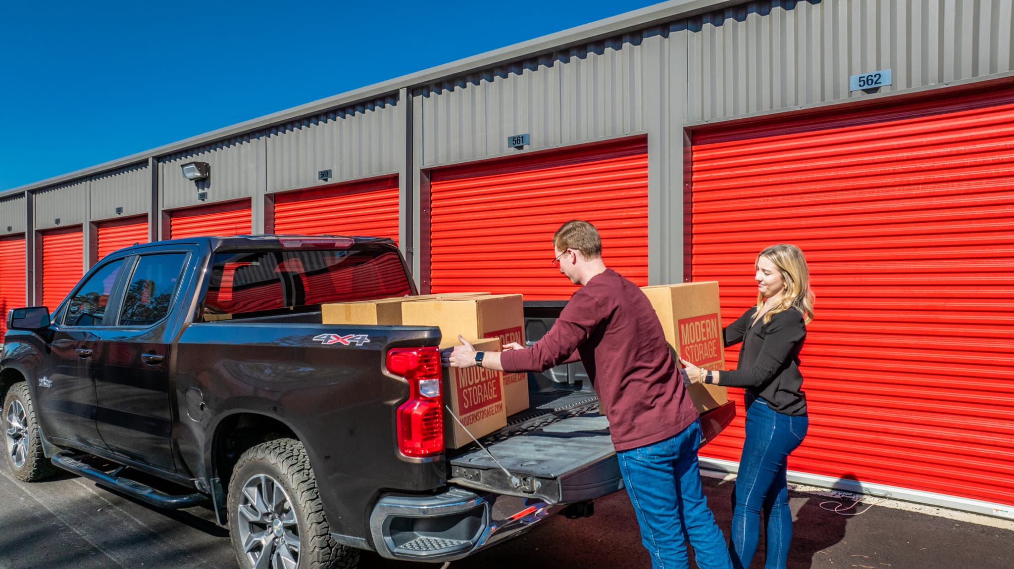 people loading a moving truck at Modern Storage during a home move