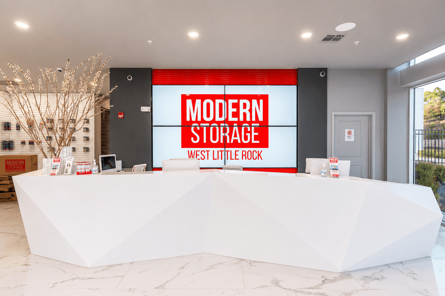 Modern Storage lobby with reception desk, complimentary coffee bar, and welcoming customer service area.