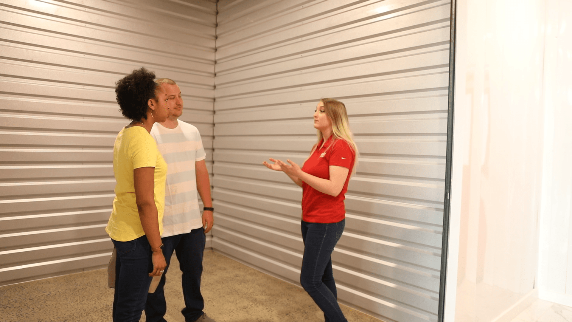 Customers viewing the size of a Modern Storage self storage unit before renting
